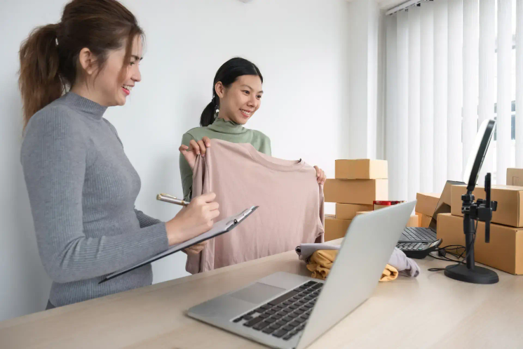 Two women ordering something online